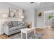 Inviting living room with modern decor and comfortable gray sofa at 281 Highland Forest Dr, Sanford, NC 27332