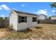 Backyard shed with a window and small porch at 281 Highland Forest Dr, Sanford, NC 27332