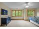 Spacious bedroom with carpeted floor, natural light, and wooden trim at 2917 Ericka Dr, Hillsborough, NC 27278