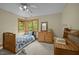 Cozy bedroom with natural light and neutral carpet at 2917 Ericka Dr, Hillsborough, NC 27278