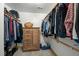 Walk-in closet with wooden shelving, cabinet, and space for storage at 2917 Ericka Dr, Hillsborough, NC 27278