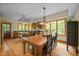 Spacious dining room featuring hardwood floors and ample natural light, perfect for gatherings at 2917 Ericka Dr, Hillsborough, NC 27278