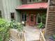 Cozy covered porch with potted plants and rocking chairs, an inviting space to relax at 2917 Ericka Dr, Hillsborough, NC 27278