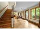 Welcoming foyer with hardwood staircase and natural light that provides a warm atmosphere at 2917 Ericka Dr, Hillsborough, NC 27278