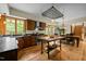 Spacious kitchen with an island, stainless steel appliances and an open dining area at 2917 Ericka Dr, Hillsborough, NC 27278