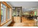 Open-concept living space with rustic wood accents and lots of natural light at 2917 Ericka Dr, Hillsborough, NC 27278