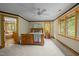 Spacious main bedroom with generous natural light, ceiling fan, and an ensuite bathroom at 2917 Ericka Dr, Hillsborough, NC 27278