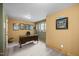 Bright home office with desk, natural light, and Michigan State decor at 2917 Ericka Dr, Hillsborough, NC 27278