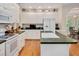 Well-appointed kitchen with white appliances, ample counter space, and an open layout at 304 Parkridge Dr, Clayton, NC 27527