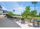 Covered patio with seating area overlooking golf course at 304 Parkridge Dr, Clayton, NC 27527