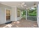 Screened porch with ceiling fan perfect for relaxing and enjoying the outdoors at 304 Parkridge Dr, Clayton, NC 27527