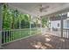 Relaxing screened porch with wood floors and views of the backyard at 304 Parkridge Dr, Clayton, NC 27527