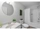 Clean bathroom featuring single sink vanity with updated faucet, tile flooring, and a shower-tub combination at 3148 Rapid Falls Rd, Cary, NC 27519