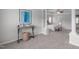 Spacious main bedroom features sitting area with a view of the main sleeping area at 3148 Rapid Falls Rd, Cary, NC 27519