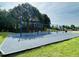 Community playground with swing sets, picnic tables, and a rubberized surface for safe play at 3148 Rapid Falls Rd, Cary, NC 27519