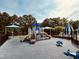 Community playground offering various play structures for active outdoor recreation at 3148 Rapid Falls Rd, Cary, NC 27519