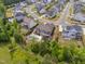 Home with pool, patio, and mature landscaping visible in this aerial view of the backyard at 3215 Bellamy Ridge Dr, Apex, NC 27523