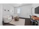 Bonus room featuring neutral walls, hard wood floors, natural lighting, and a modern aesthetic at 3215 Bellamy Ridge Dr, Apex, NC 27523