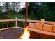Cozy outdoor seating area with a fire pit and vineyard views on the deck at 3215 Bellamy Ridge Dr, Apex, NC 27523