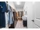 Functional walk-in closet providing ample storage with shelving, drawers, and hanging space at 3215 Bellamy Ridge Dr, Apex, NC 27523