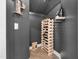 Cozy wine cellar with a wooden wine rack, creating a perfect space for wine storage and display at 3215 Bellamy Ridge Dr, Apex, NC 27523