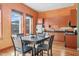 Cozy kitchen features stainless appliances, black countertops, and a breakfast table at 323 W Main St # C, Durham, NC 27701