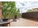 Outdoor patio offers a relaxing space with wooden deck and lounge seating at 323 W Main St # C, Durham, NC 27701