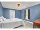 Comfortable bedroom with carpet flooring, a window, and a double closet at 3809 Victorian Grace Ln, Apex, NC 27539