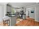 Well-lit kitchen with an island and stainless steel appliances at 3902 Booker Ave, Durham, NC 27713