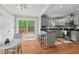 Modern kitchen with stainless steel appliances and granite countertops at 3902 Booker Ave, Durham, NC 27713