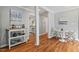 Cozy living area featuring hardwood floors, neutral walls, and a bright open space at 3902 Booker Ave, Durham, NC 27713