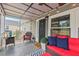Relaxing screened porch with comfortable seating and decor at 3902 Booker Ave, Durham, NC 27713