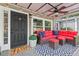 Cozy screened porch featuring comfortable outdoor seating at 3902 Booker Ave, Durham, NC 27713