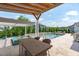 This backyard features a luxurious pool, spa, and outdoor bar area, creating an ideal space for relaxation at 400 Chickasaw Plum Dr, Holly Springs, NC 27540