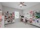 Craft room with work station, overhead lighting, and yarn storage at 400 Chickasaw Plum Dr, Holly Springs, NC 27540