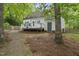 Beautiful backyard with deck, and plenty of trees at 404 Trappers Run Dr, Cary, NC 27513