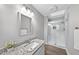 Clean bathroom with granite countertops, a modern sink, and a tiled walk-in shower with a glass door at 404 Trappers Run Dr, Cary, NC 27513