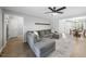 Comfortable living room with a large gray sectional sofa and neutral decor at 404 Trappers Run Dr, Cary, NC 27513