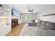 Inviting living room with a fireplace, built-in shelves, and a comfortable gray sofa at 404 Trappers Run Dr, Cary, NC 27513