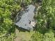Aerial view of home with mature trees and a large backyard at 4041 Brook Cross Dr, Apex, NC 27539