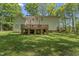 Exterior home view of a spacious backyard and patio at 4041 Brook Cross Dr, Apex, NC 27539