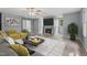 Open living room offering modern decor, hardwood floors, and plenty of light at 4041 Brook Cross Dr, Apex, NC 27539