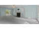 Spacious living room with light blue walls, carpet floors, and a fireplace with a marble surround at 4041 Brook Cross Dr, Apex, NC 27539