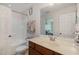 Bathroom featuring a shower over tub and a vanity with good storage at 412 Stone Flower Ln, Raleigh, NC 27603