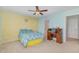 Bedroom with carpet flooring and an adjoined vintage wooden desk at 412 Stone Flower Ln, Raleigh, NC 27603