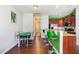 Open dining area with view of kitchen and living space at 412 Stone Flower Ln, Raleigh, NC 27603