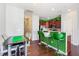 Open dining area with view of kitchen and hallway at 412 Stone Flower Ln, Raleigh, NC 27603