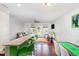 Open living and dining area with hardwood floors and modern decor at 412 Stone Flower Ln, Raleigh, NC 27603