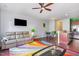 Open living and dining area with hardwood floors and modern decor at 412 Stone Flower Ln, Raleigh, NC 27603