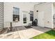 Outdoor patio area with table, chairs, and access to backyard space at 412 Stone Flower Ln, Raleigh, NC 27603